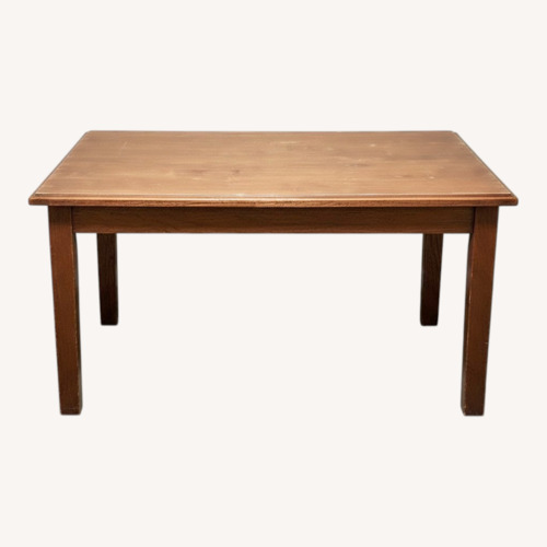 Used Light Brown Wood Dining Table for sale on AptDeco
