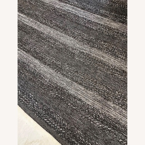 Used Crate & Barrel Dark Gray Area Rug 10' x 14' for sale on AptDeco