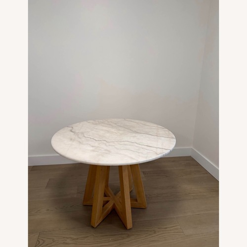 Used Four Hands Marble Dining Table for sale on AptDeco