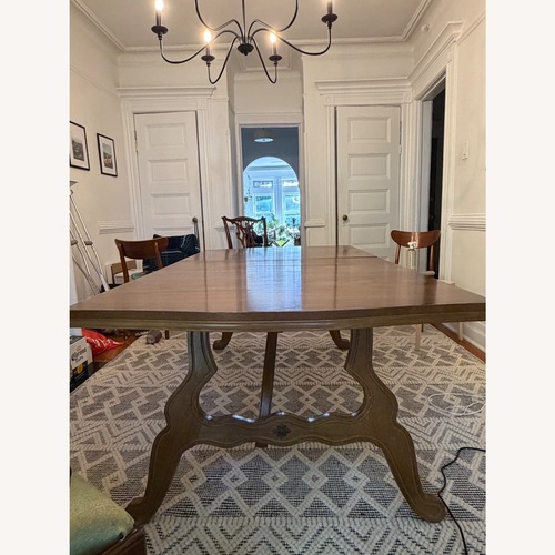 Used Vintage/Antique Light Brown Dining Table for sale on AptDeco