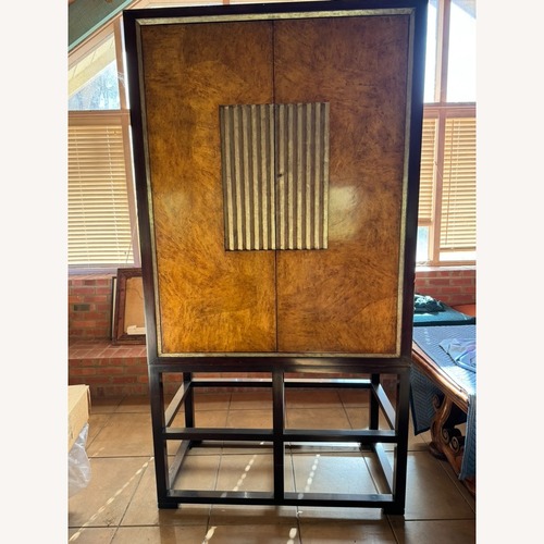 Used Dark Brown Wood Armoire for sale on AptDeco