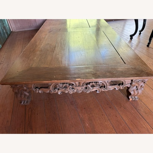 Used Dark Brown Wood Coffee Table for sale on AptDeco