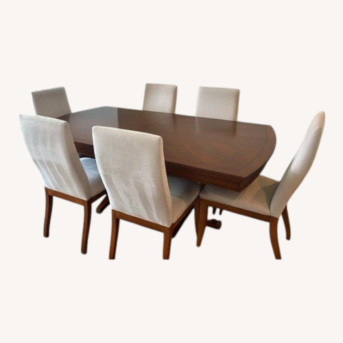 Used Dark Brown Wood Dining Set for sale on AptDeco