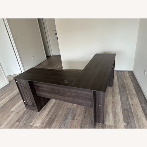 Used Home Depot Dark Brown Wood Desk for sale on AptDeco