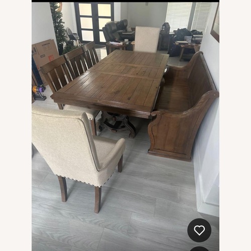 Used Ashley Furniture Light Brown Wood Dining Table for sale on AptDeco