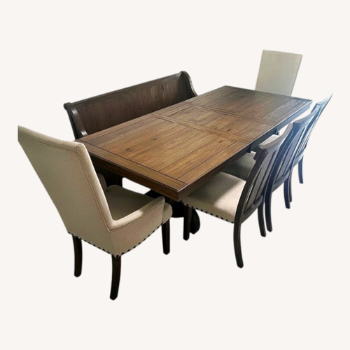 Used Ashley Furniture Light Brown Wood Dining Table for sale on AptDeco