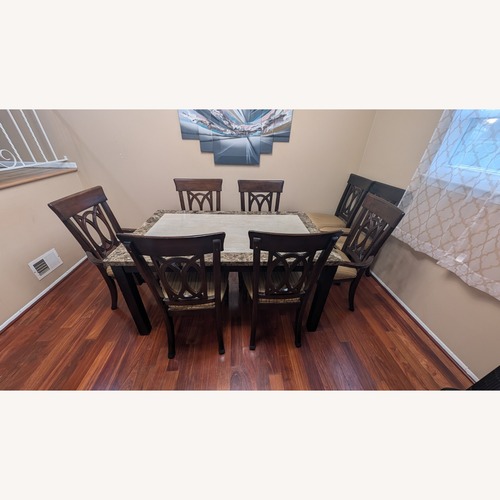 Used Dark Brown Marble Dining Set for sale on AptDeco