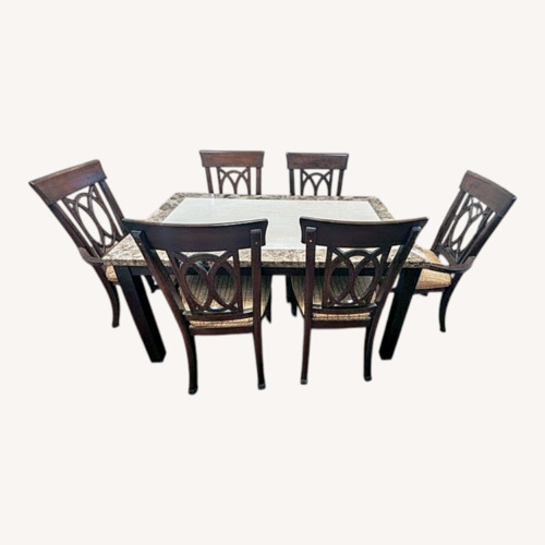 Used Dark Brown Marble Dining Set for sale on AptDeco