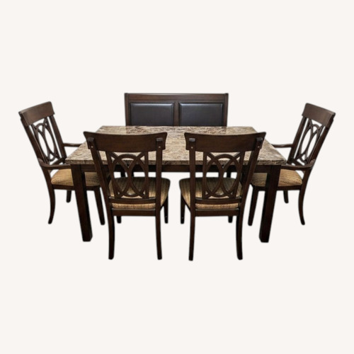 Used Dark Brown Marble Dining Table with 8 Chairs for sale on AptDeco