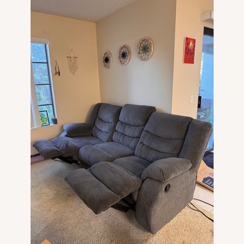 Used Charcoal Gray Reclining Sofa for sale on AptDeco