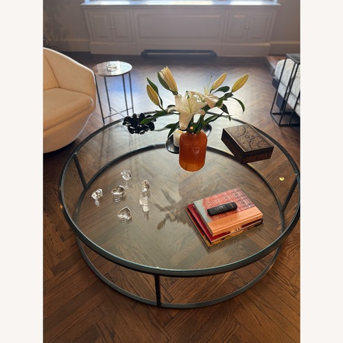 Used Nicholas Glass Round Coffee Table for sale on AptDeco