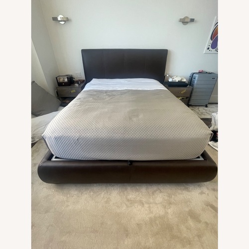 Used Dark Brown Leather Queen Storage Bed for sale on AptDeco
