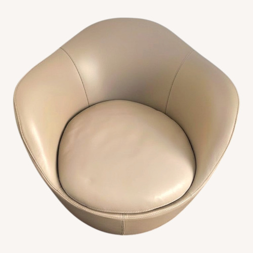 Used Tan Leather Accent Swivel Chair for sale on AptDeco