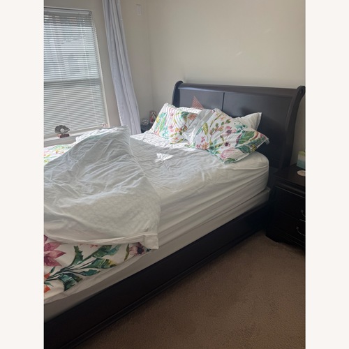 Used Raymour & Flanagan Queen Bed Frame for sale on AptDeco