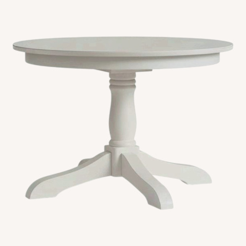 Used Pottery Barn Owen Wood Oval Extending Pedestal Dining Table for sale on AptDeco