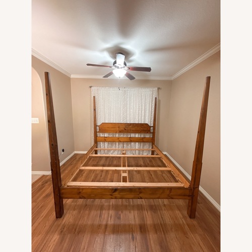 Used Taylor Made Custom Amish-Made Solid Wood King Bed Frame for sale on AptDeco