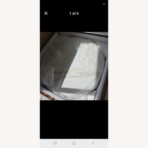 Used Amazon Marbled Stone Coffee Table for sale on AptDeco