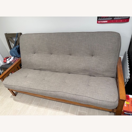 Used Kodiak Monterey Light Gray Wood Futon for sale on AptDeco