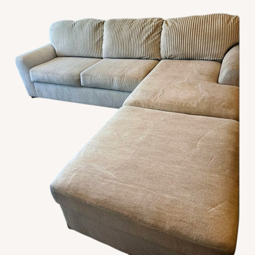 Used Cream Sectional Sofa + Oversized Ottoman for sale on AptDeco