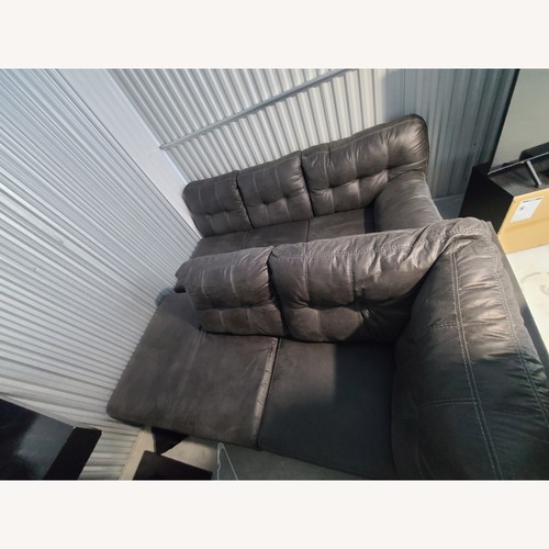 Used Dark Gray Leather 2 Piece Sectionals for sale on AptDeco
