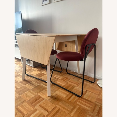 Used IKEA PS 2012 Natural Wood Dining Table for sale on AptDeco