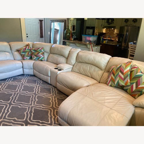 Used Ashley Silverbrooke 6-Piece Leather Dual Power Reclining Modular Sectional with Chaise for sale on AptDeco