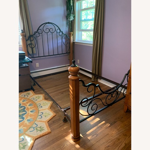 Used Full Size Wood & Wrought Iron Scroll Bed Frame for sale on AptDeco