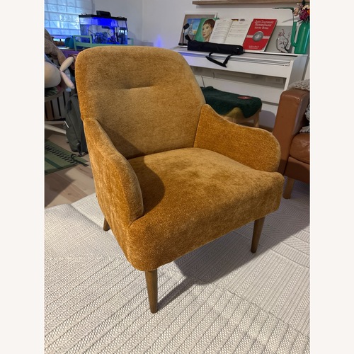 Used Orange Fabric Accent Chair for sale on AptDeco