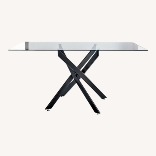 Used Glass Dining Table With Modern Black Base for sale on AptDeco