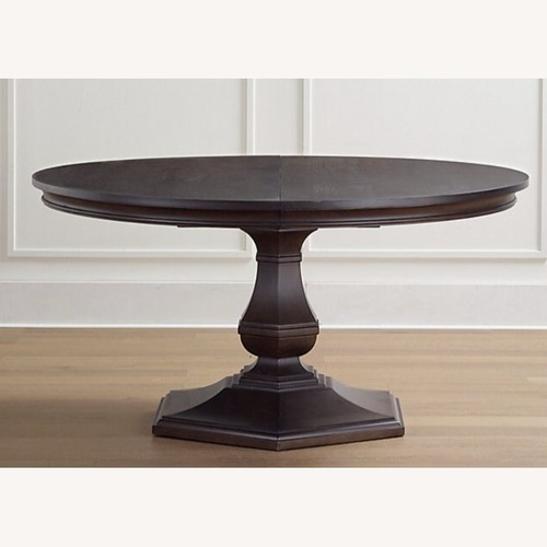 Used Hunter Expandable Round Dining Table for sale on AptDeco