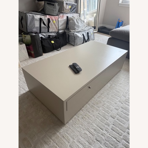 Used West Elm White Billy Cotton Lacquered Coffee Table (50") for sale on AptDeco