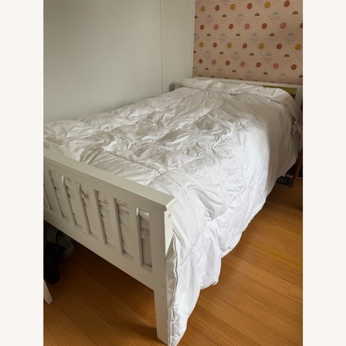 Used White Wood Twin Bed with Headboard and Footboard for sale on AptDeco