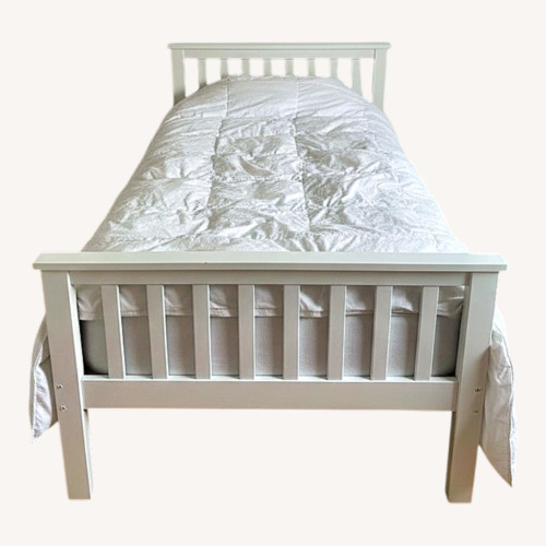 Used White Wood Twin Bed with Headboard and Footboard for sale on AptDeco