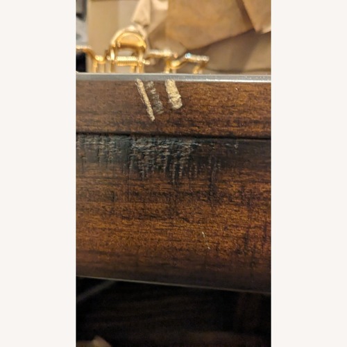 Used Pottery Barn Benchwright Dark Brown Wood Dining Table for sale on AptDeco