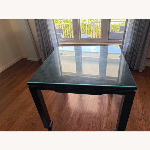 Used Dark Brown Wood Card or Small Dining Table for sale on AptDeco