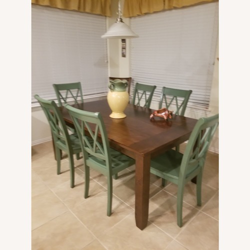 Used Dark Brown Wood Dining Set for sale on AptDeco