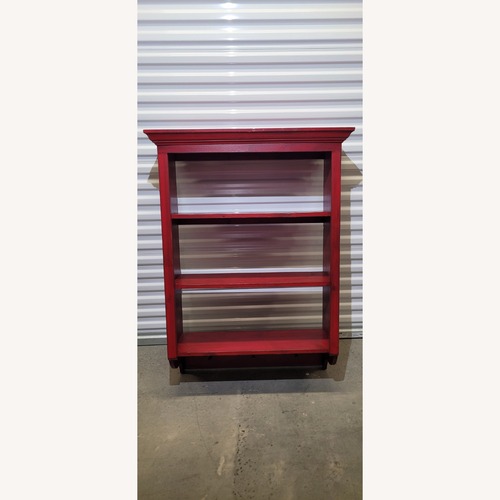 Used Red Wood Bookcase for sale on AptDeco