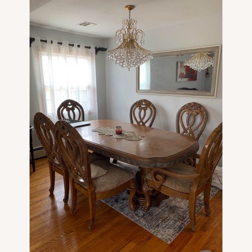 Used Light Brown Wood Dining Set for sale on AptDeco