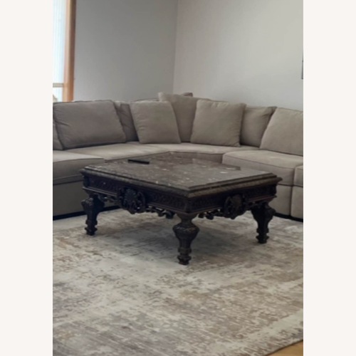 Used Dark Brown Wood Coffee Table for sale on AptDeco