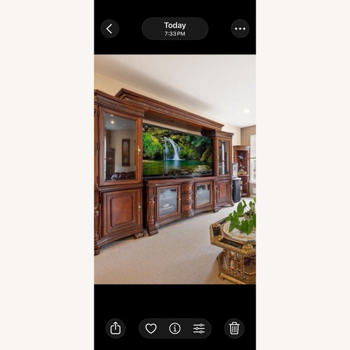 Used Raymour & Flanigan Wooden Entertainment Center  for sale on AptDeco