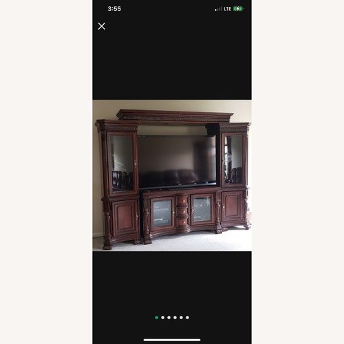 Used Raymour & Flanigan TV a stand and Glass Shelves  for sale on AptDeco