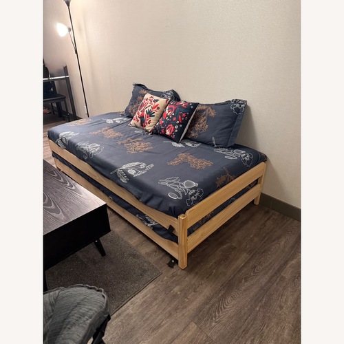 Used IKEA UTÅKER Natural Wood Daybed for sale on AptDeco