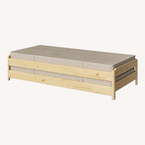 Used IKEA UTÅKER Natural Wood Daybed for sale on AptDeco