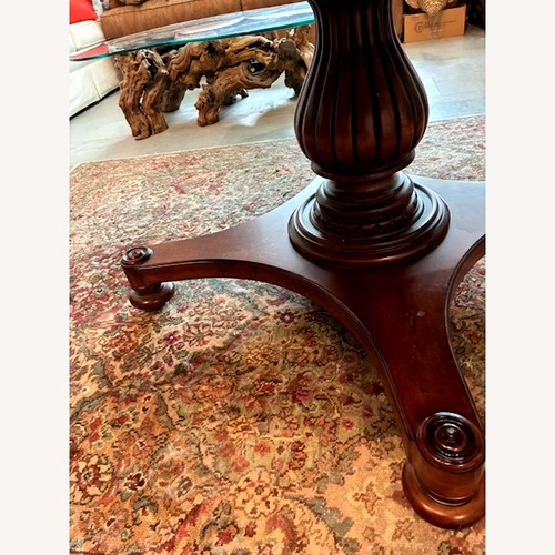 Used Ethan Allen Dark Brown Wood Dining Table for sale on AptDeco