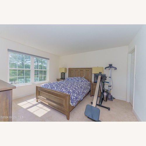 Used Pottery Barn Natural Wood Queen Bed for sale on AptDeco