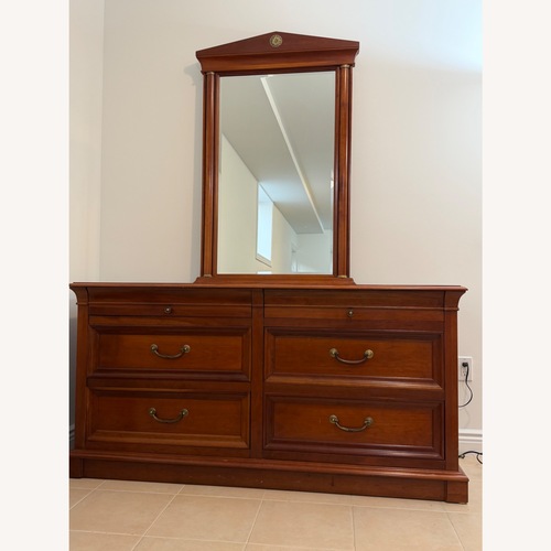 Used Ethan Allen Dark Brown Wood Dresser for sale on AptDeco