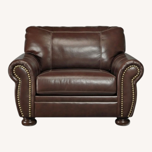 Used Signature Design by Ashley Brown Leather Armchair for sale on AptDeco