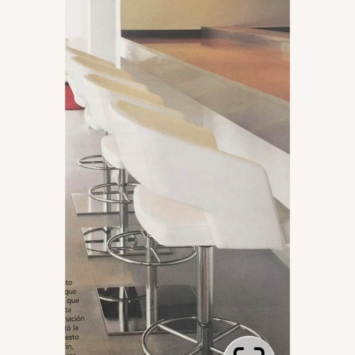 Used 4 Stools “Jolly” White Leather Pottoco Italy for sale on AptDeco
