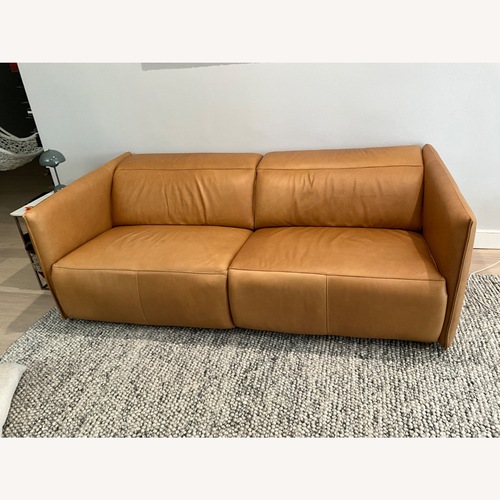 Used Crate & Barrel Leisure Leather Power Reclining Sofa for sale on AptDeco