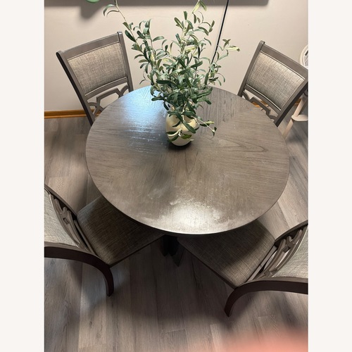 Used Ashley Furniture Dark Gray Wood Dining Set for sale on AptDeco